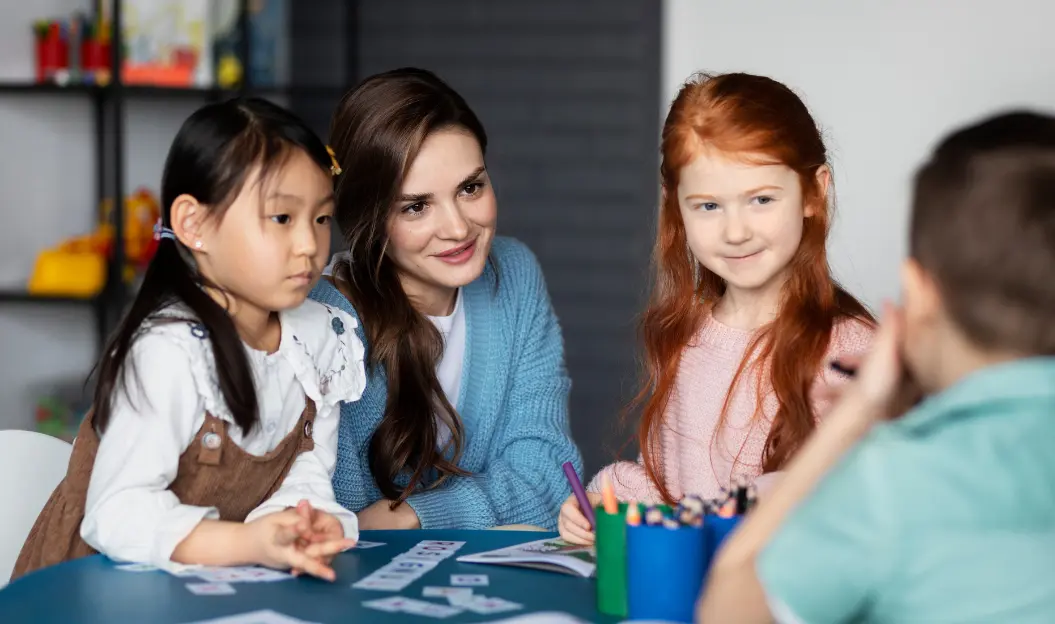 Preschool Teacher Guiding Children in Mindfulness and Emotional Awareness Activities.